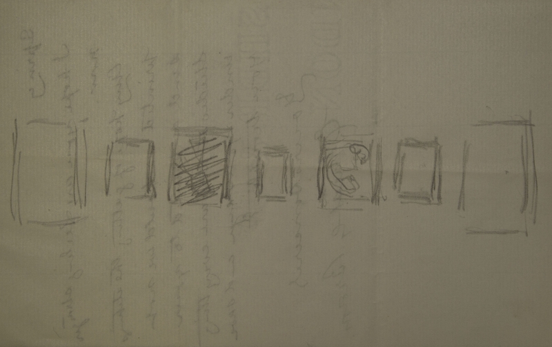 A panel of picture frames on a wall